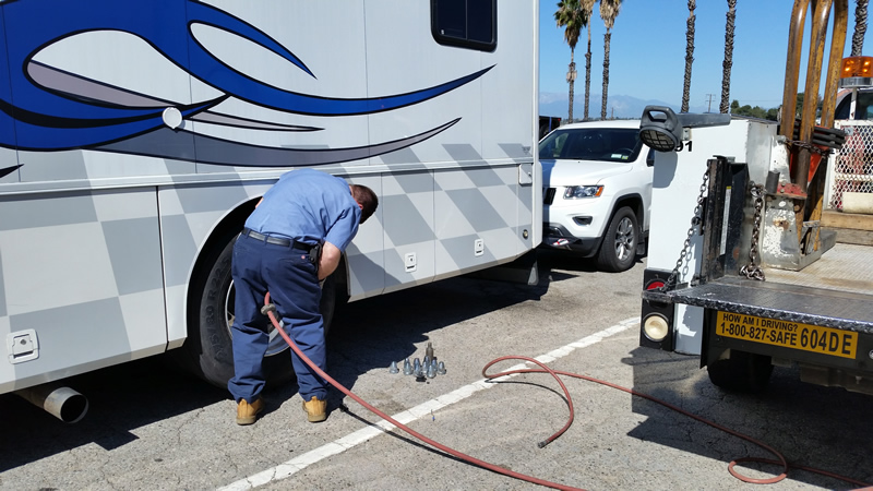 There is no way an RV or truck owner could change their own tire. That's why most trucks don't carry spares!
